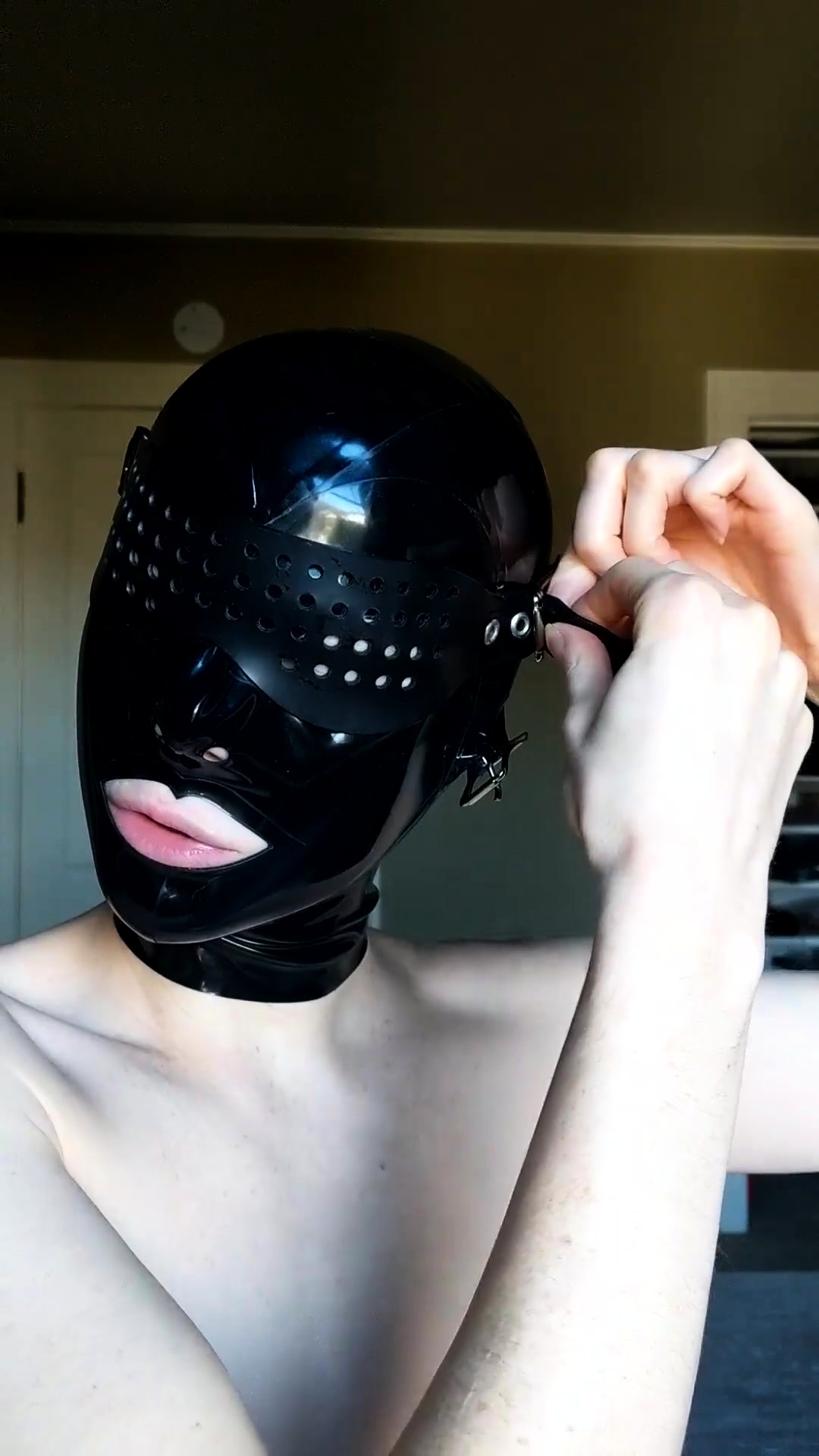 Beautiful Amateur BDSM Fetishist Trying On Latex Hood Mask Video at Porn image picture